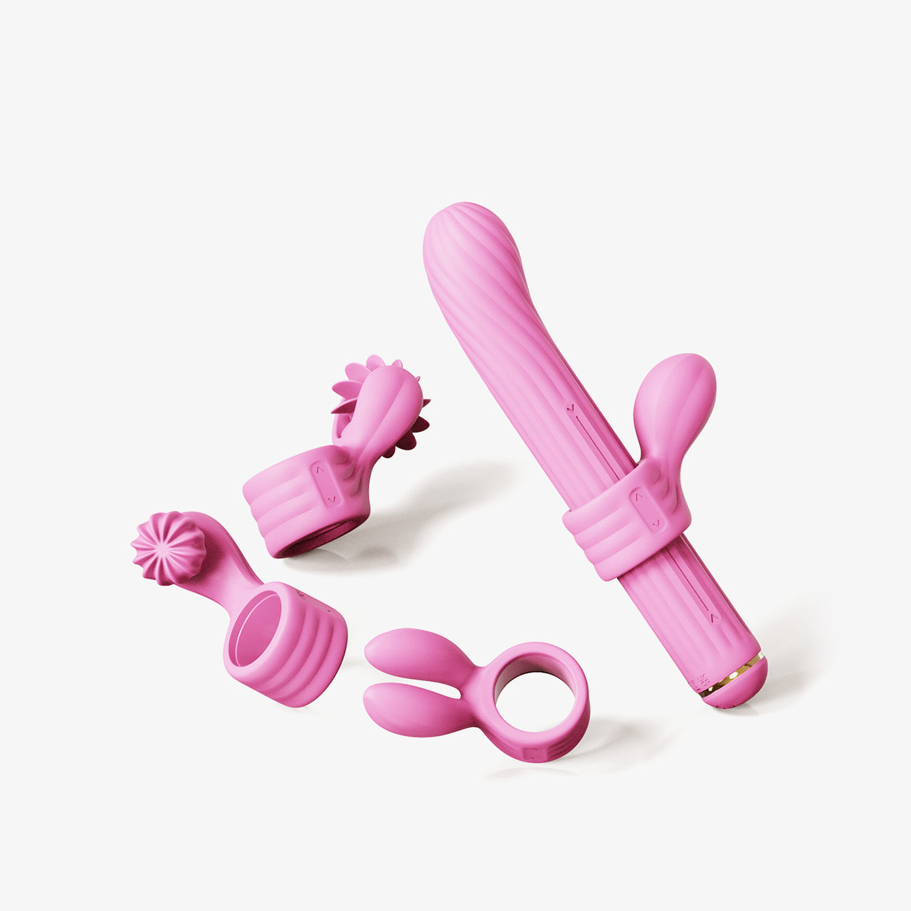 Pink vibrator with multiple silicone attachments for clitoral, G-spot, and stimulating massage